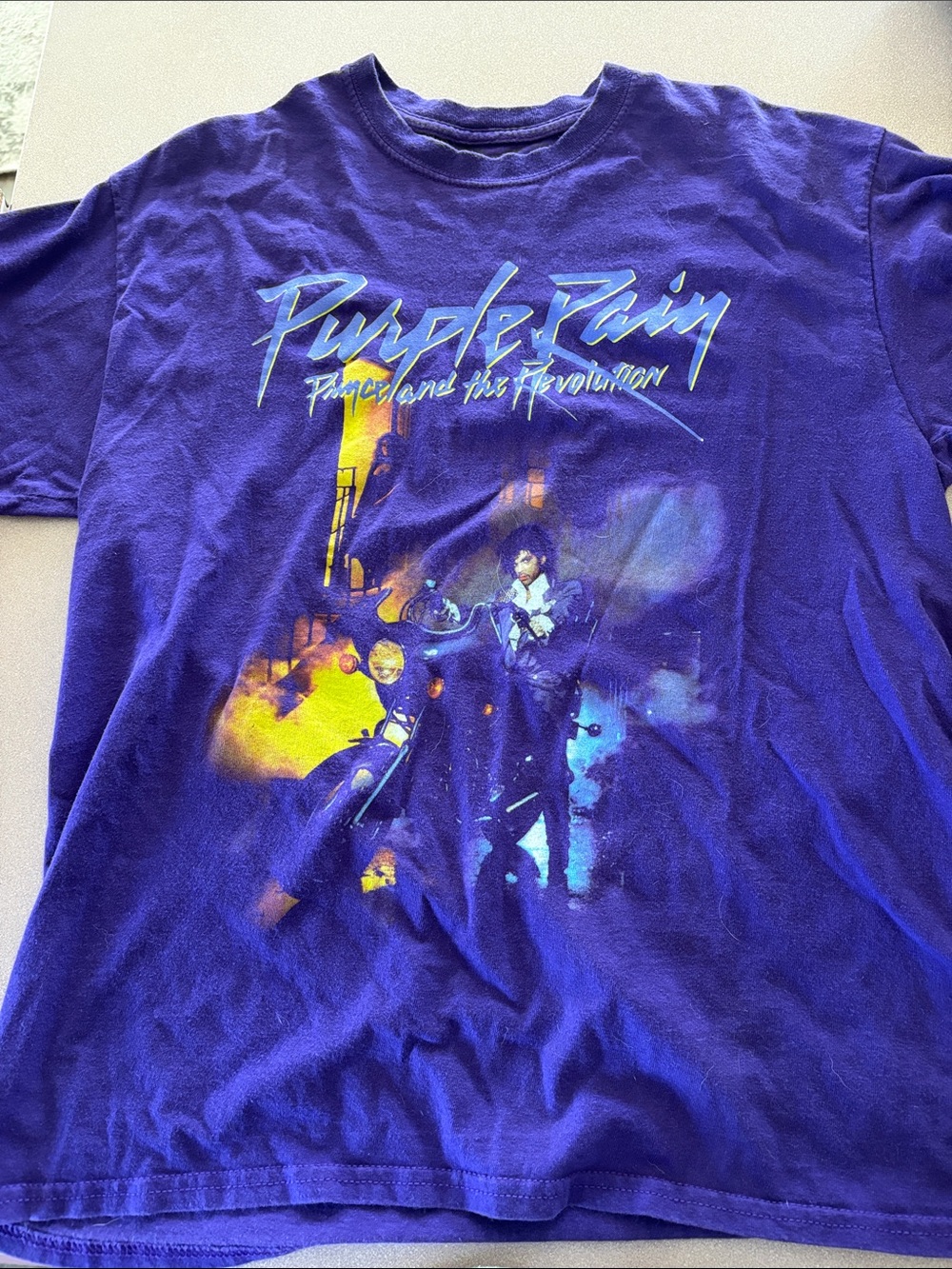 Prince Purple Graphic Tee with Yellow & Blue Accents